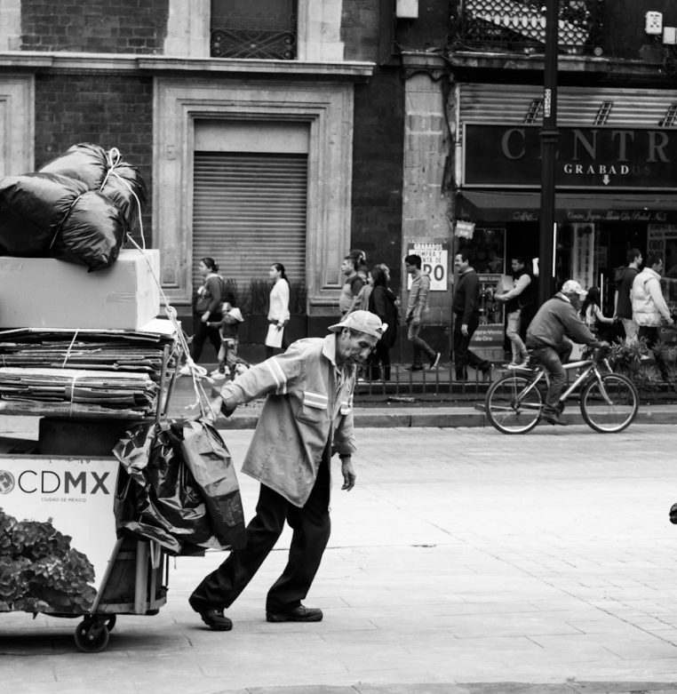How to Redesign or Move a Website Without Losing Google Rankings Man pulling a wagon with cardboard boxes