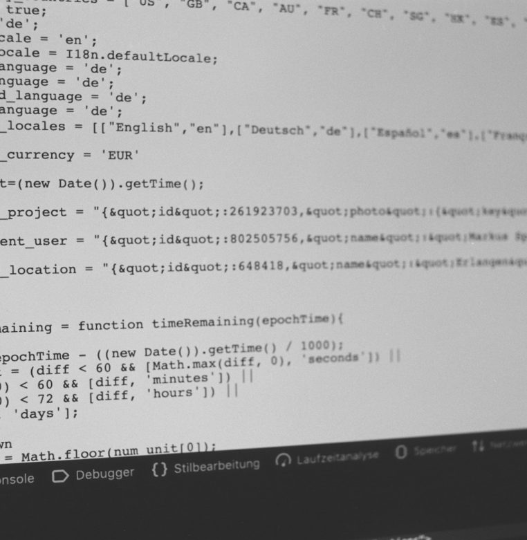 WordPress or Next.js: Choosing the Right Stack for Your Business Computer screen showing source code